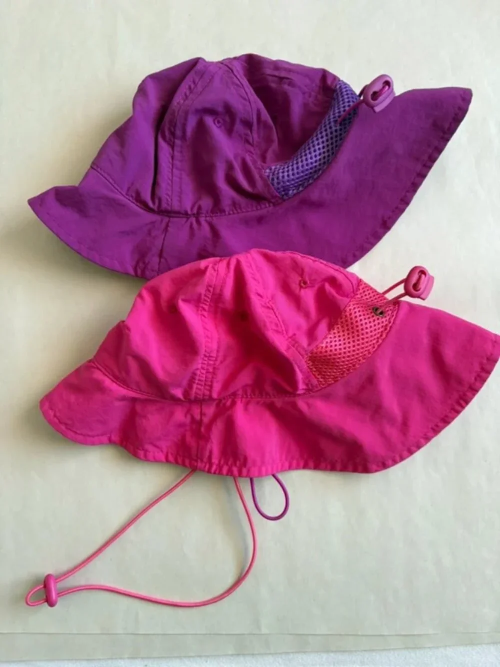 Two kids sun hats with adjustable straps